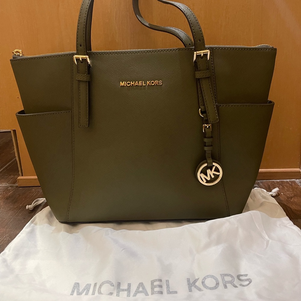 Like new, worm once , olive purse